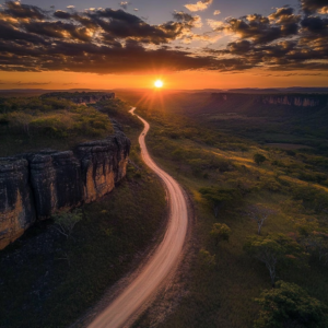 Scenic off-the-beaten-path destination featuring a winding dirt road, unique rock formations, and lush vegetation.